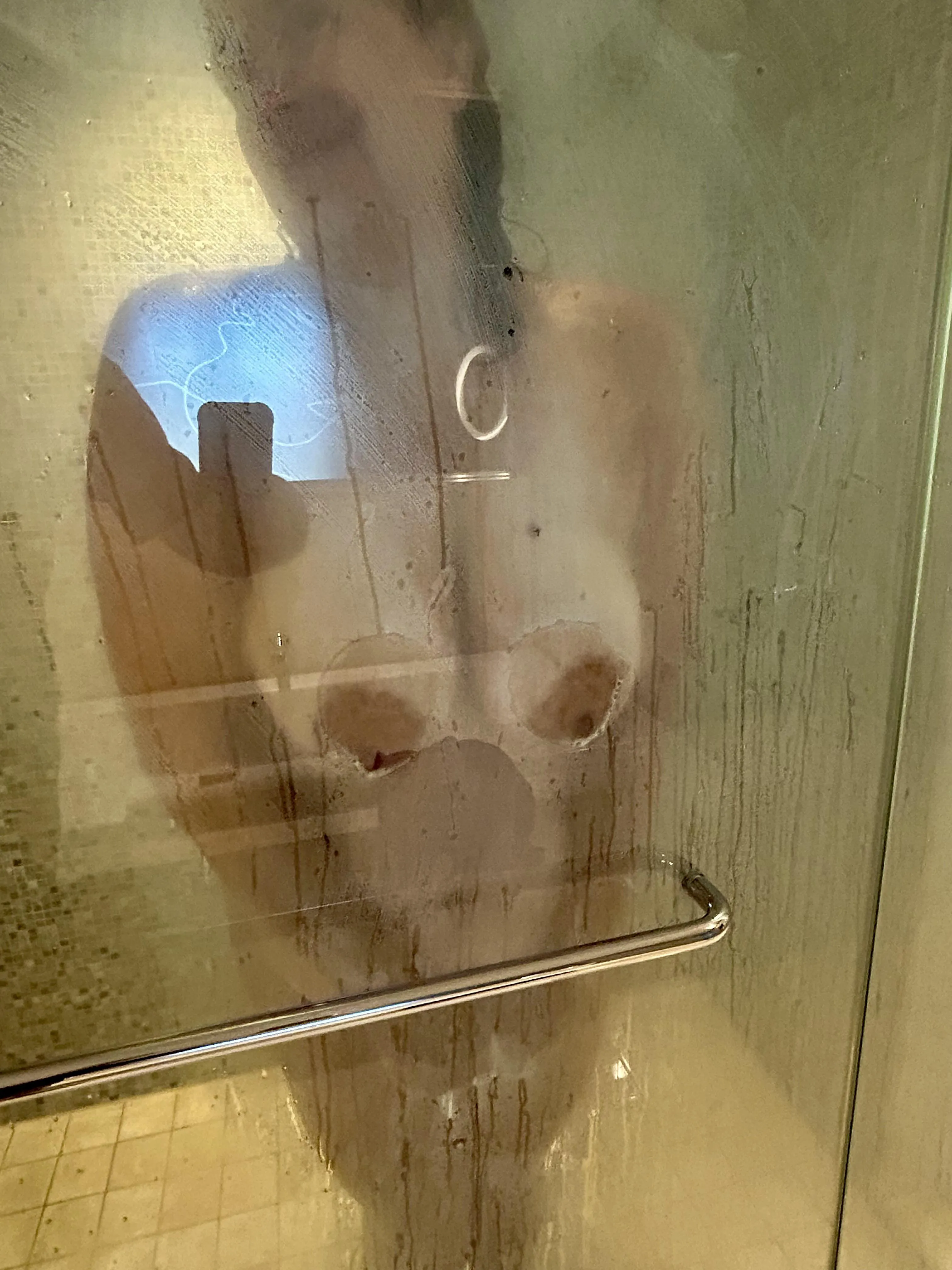 Shower door press at the Cosmopolitan. One of my favorite ways to tease my photographer/husband