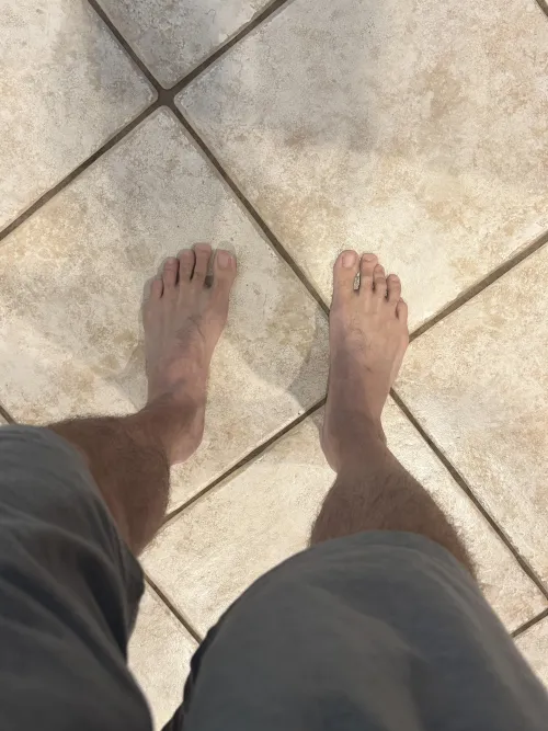 Gray shorts and 11.5 US