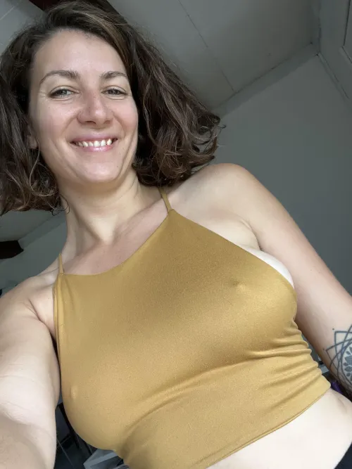 Spilling out of this cute top