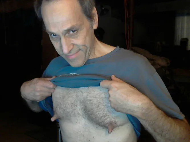 JUST A SHIRT LIFT AWAY