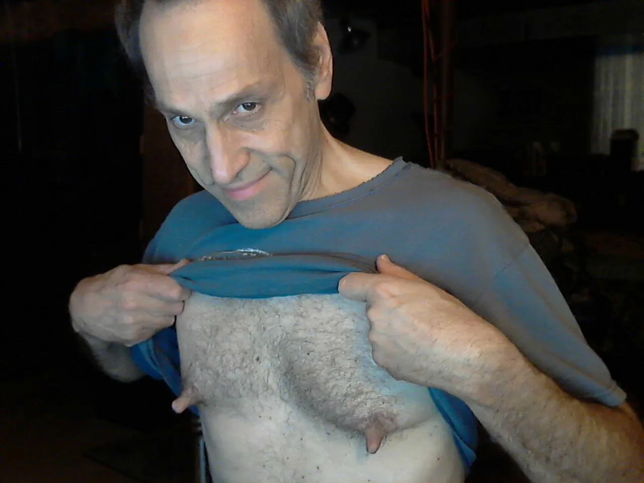 JUST A SHIRT LIFT AWAY