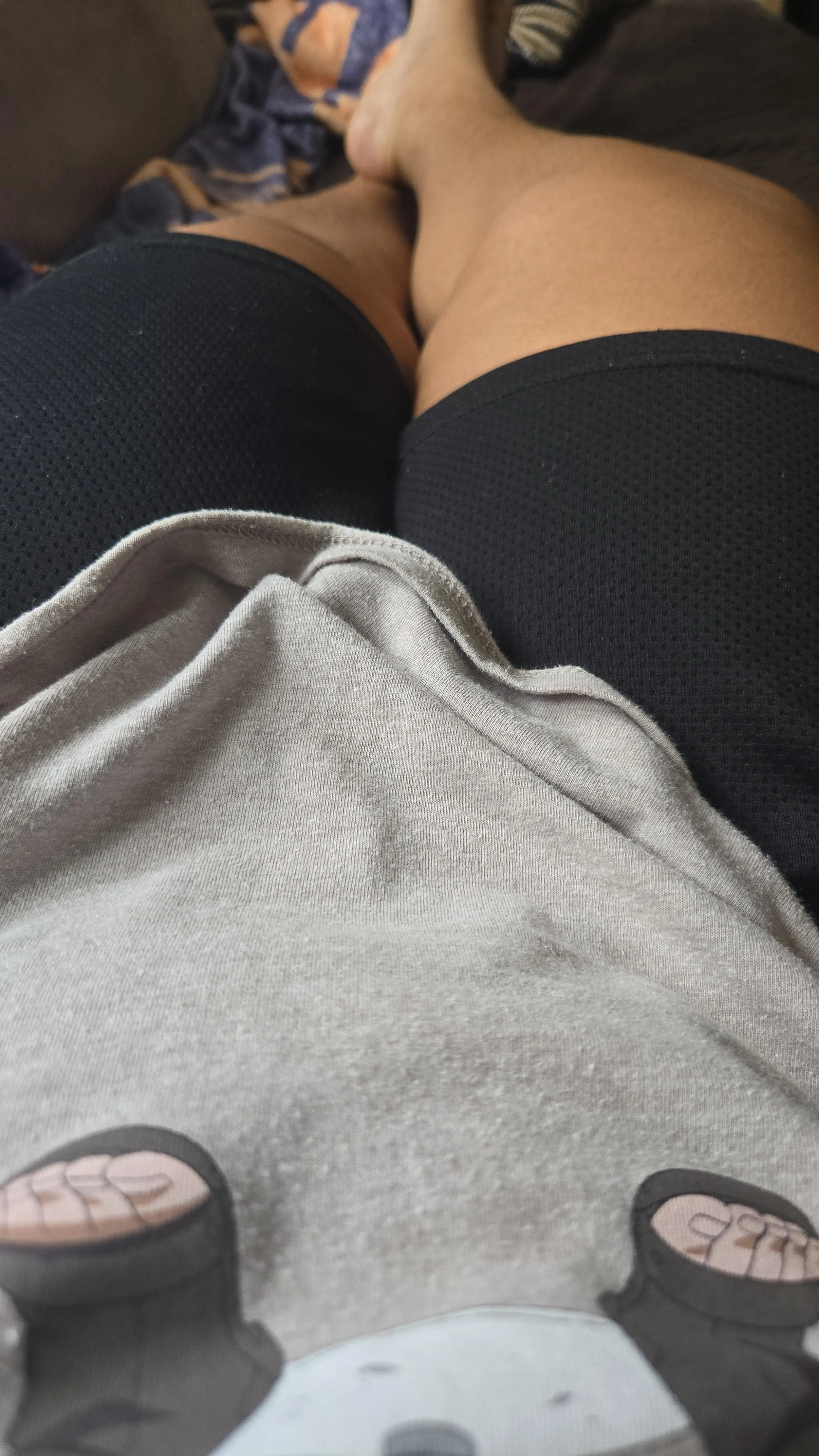 (26TML4DD.) Laying on the couch rn watching cartoons on my phone.