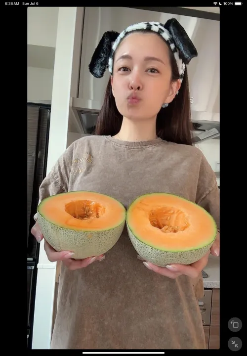 Mary proudly showing off her melons