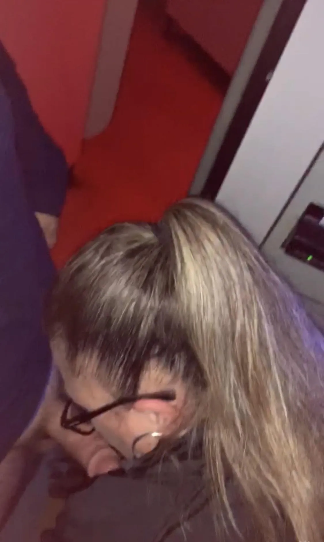 On my knees in a booth