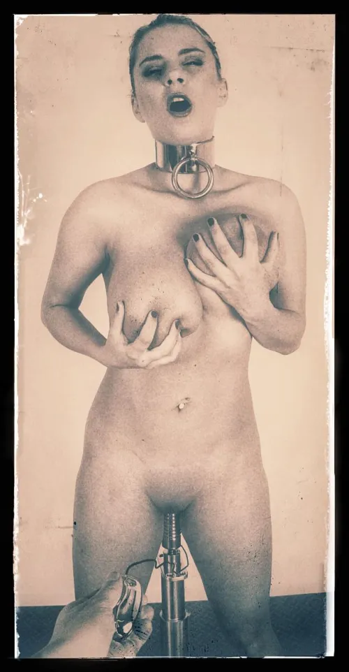 This photograph appears to depict a punishment session from the archives but it is not what it seems.