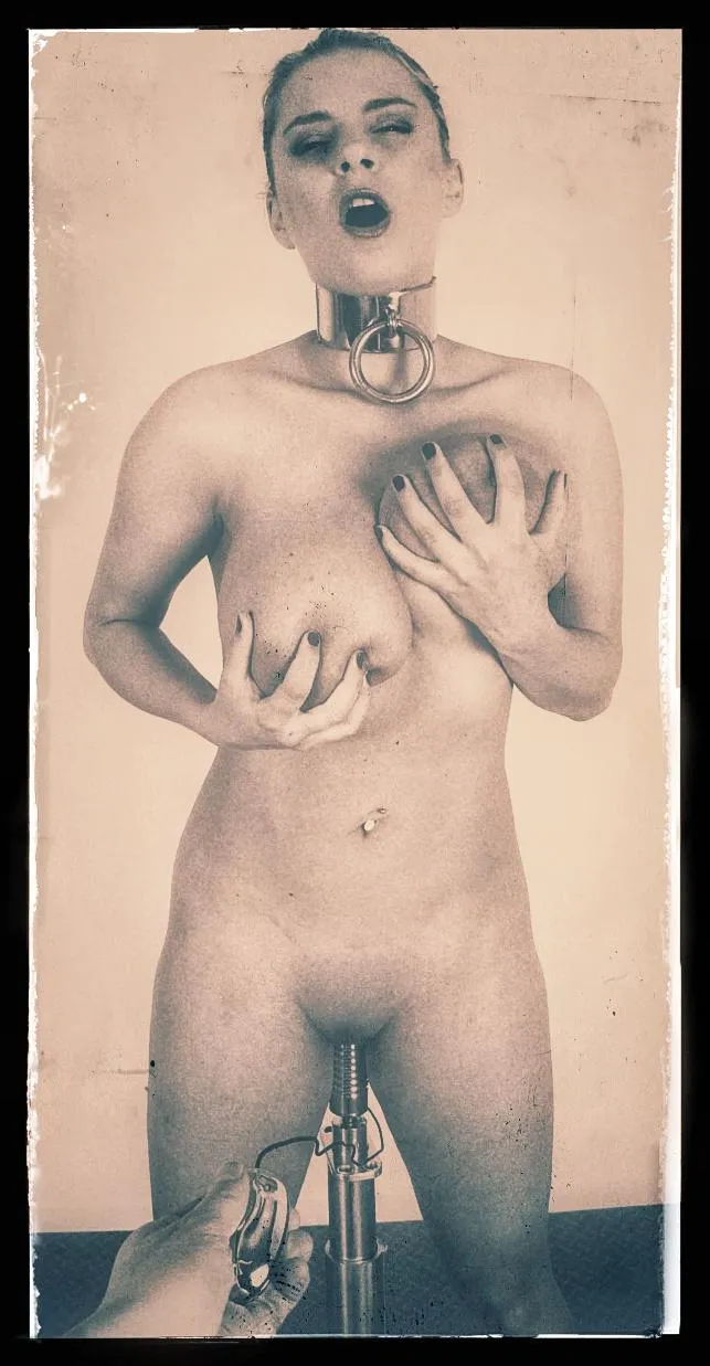 This photograph appears to depict a punishment session from the archives but it is not what it seems.