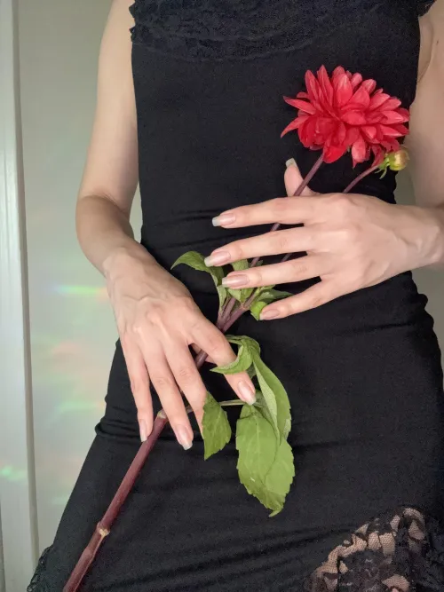 Gripping a flower but I know you wish it was something else ;)