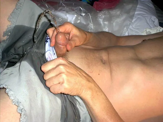 I love to piss-wet these shorts and undies while lying on my plastic sheet