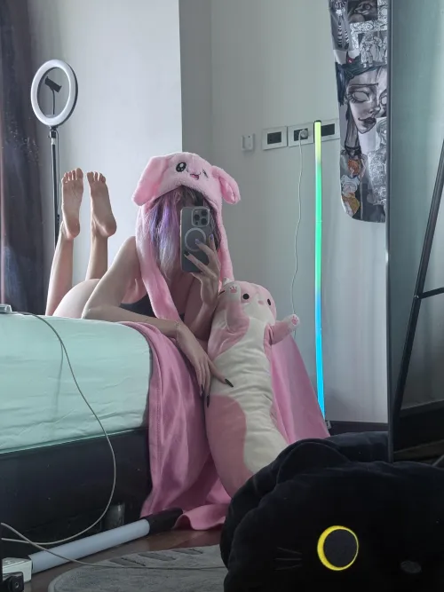 pink bunny with human paws