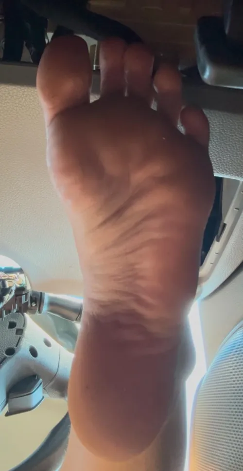 Sneaky picture of my big foot in the car