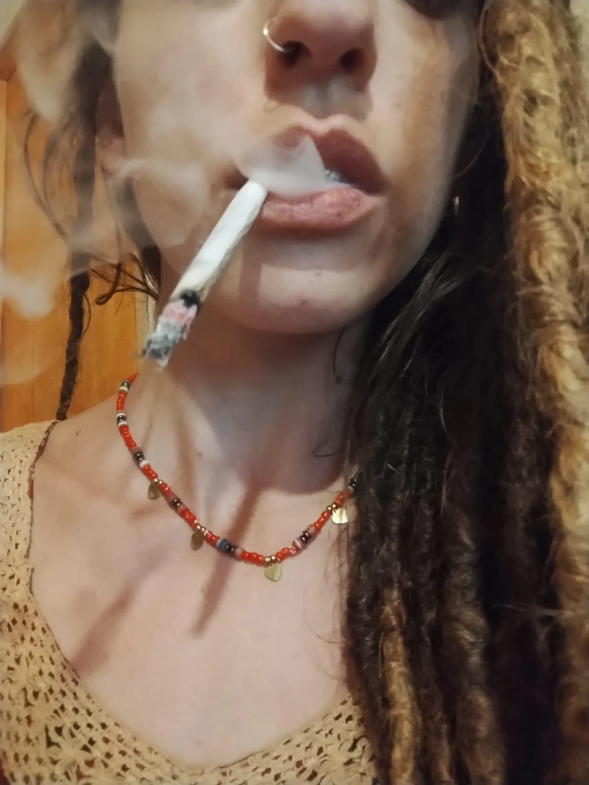 Do you mind if I smoke while I work on ur cock?