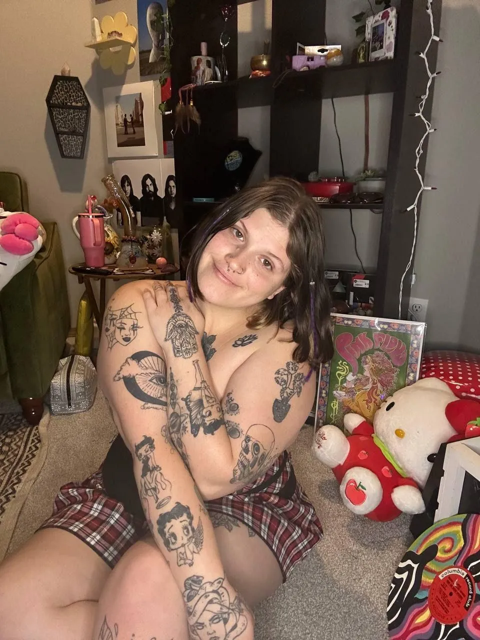 Tattooed all over and curvy