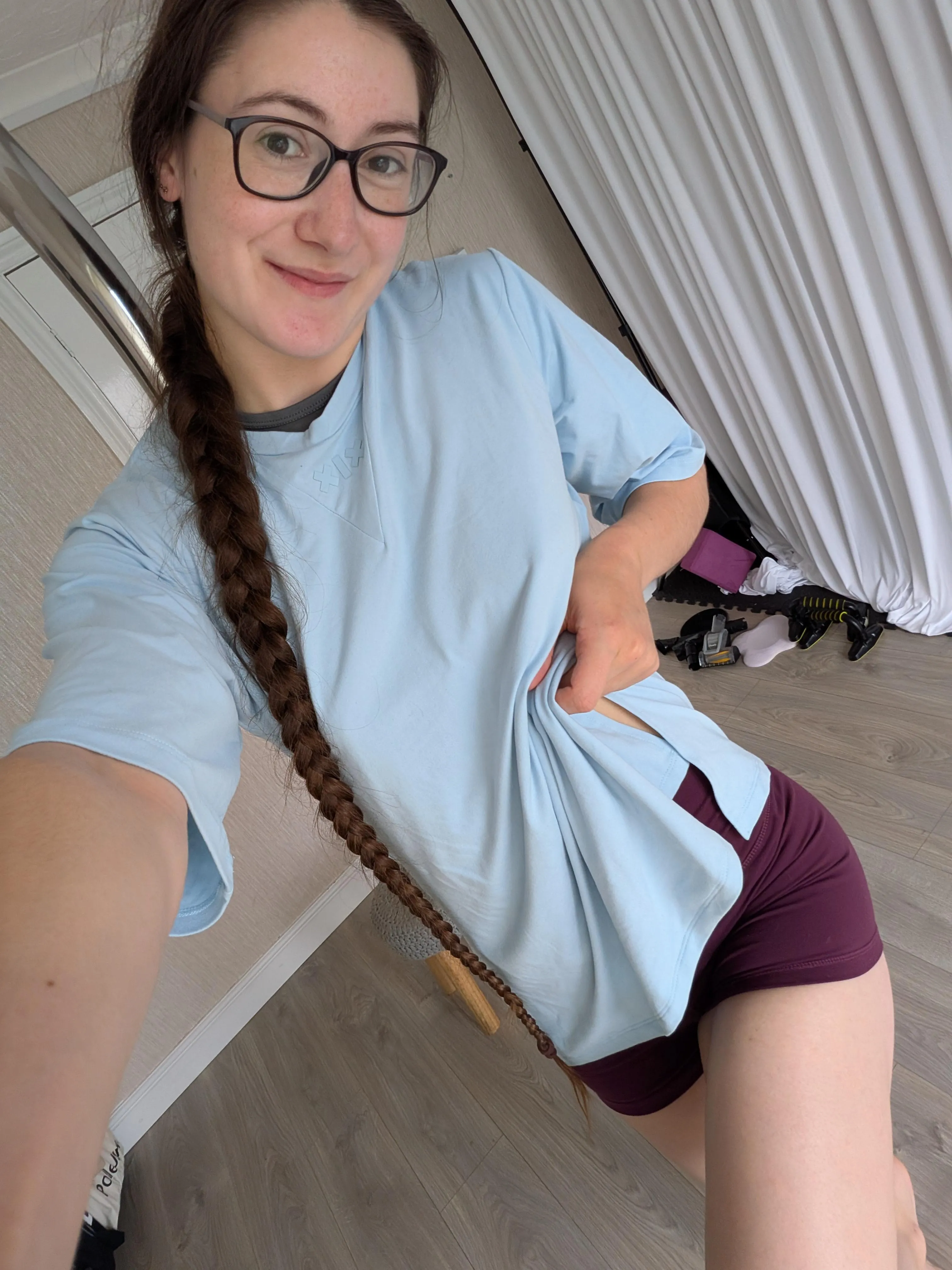 Natural skin, cozy layers, and a quiet little tease