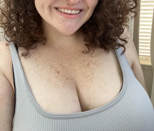 Soft freckles, soft smile, and a grip on you that’s anything but