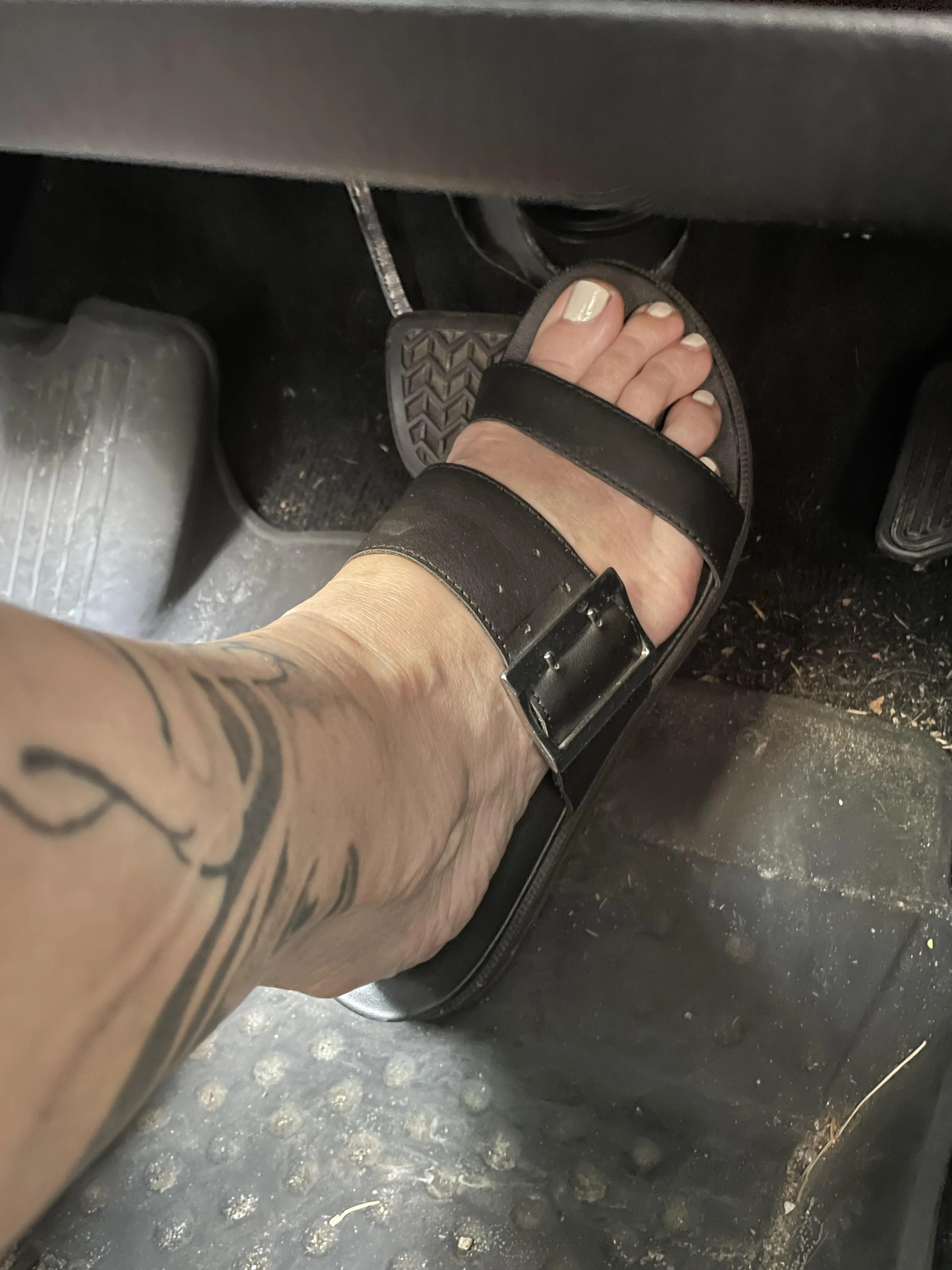 Who likes pictures of feet in the car?