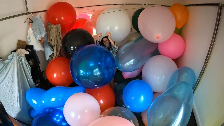 You like balloons? How about a cabin full of them!
