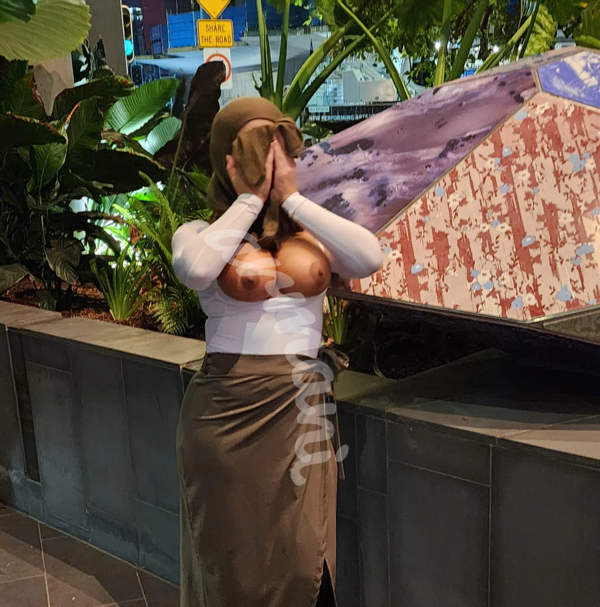 Muslimah tits out in public