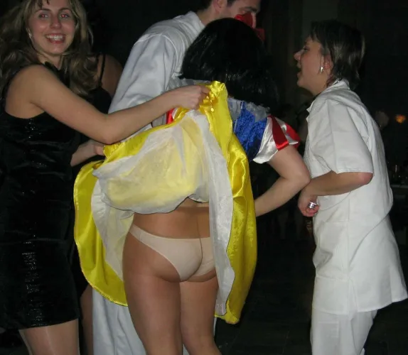 Snow White’s skirt lifted revealing tights with panties underneath