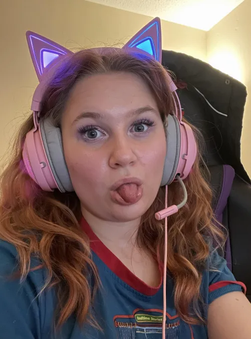 Tongue out, headset on, can't resist this cutie?