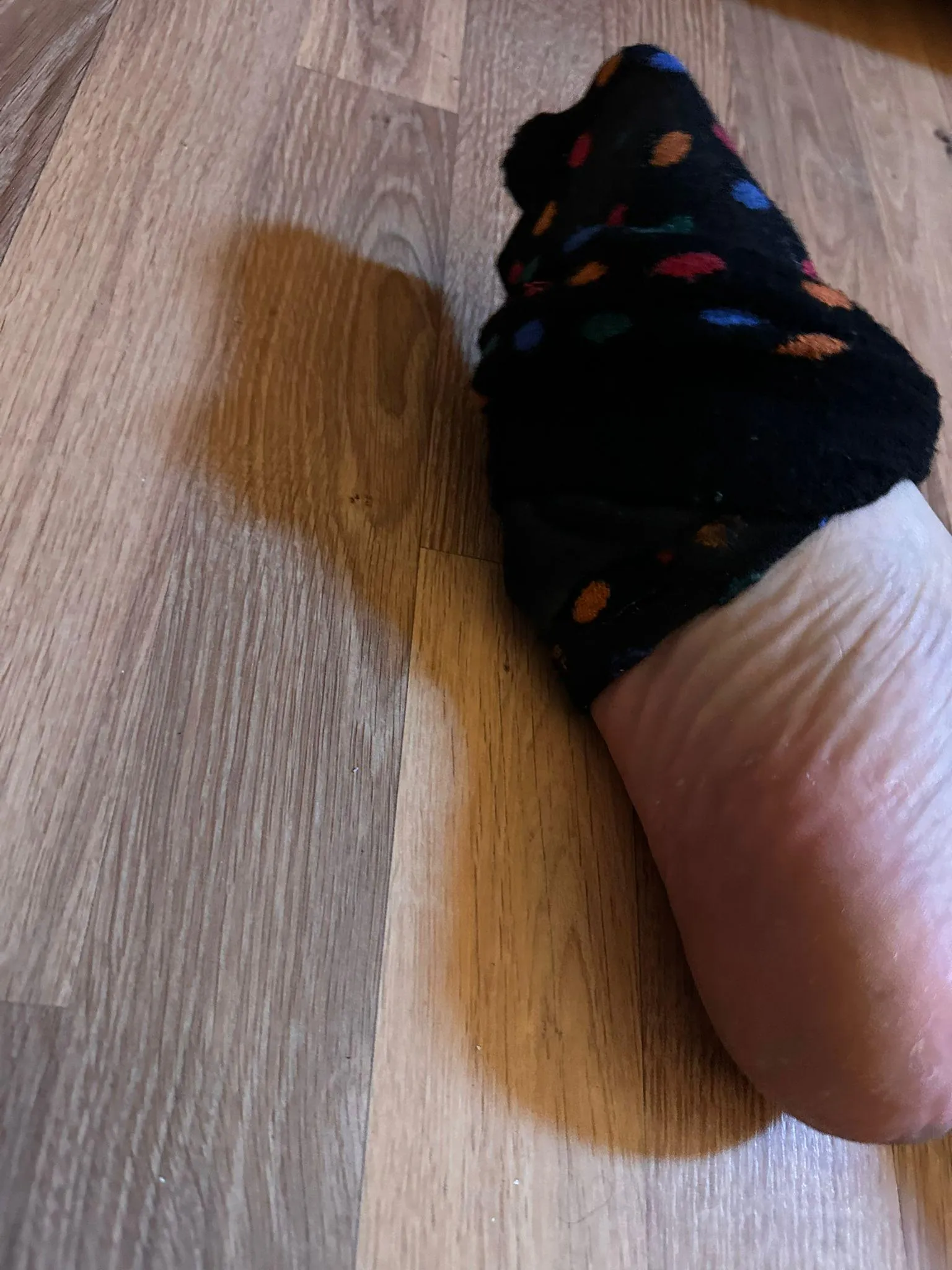 Caught mid-strip.
Sock half-off, sweat still clinging.
You already know what happened after this… but you’re not getting that part here. DM me to see the full video