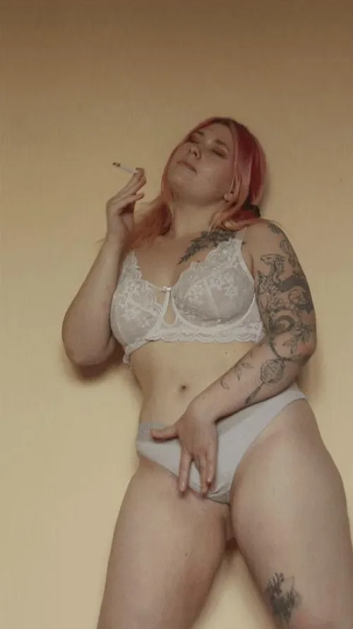 I think it's very sexy a woman in lingerie with a cigarette in her hand