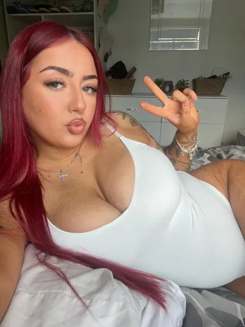 Red hair, white bodysuit combo