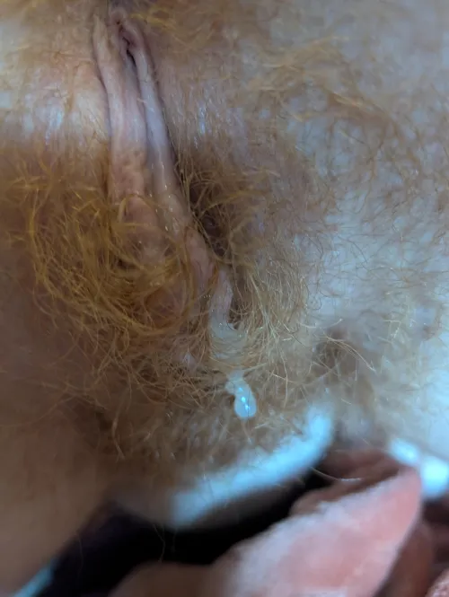 Creamy pussy and a beautiful red bush