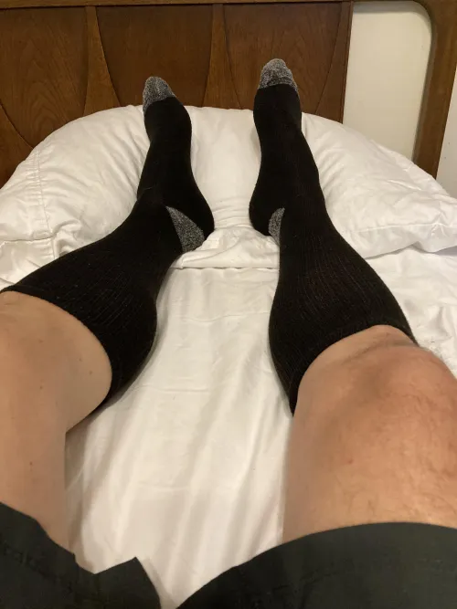 Knee high black socks with gray toes and heels