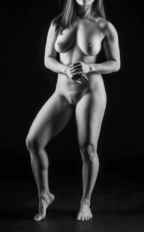 Every inch of me stands in quiet defiance, every shadow tracing my fire.