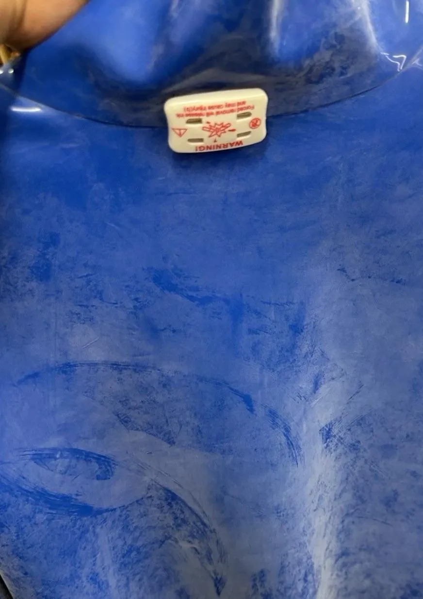 Did they really shove a security pin through latex?