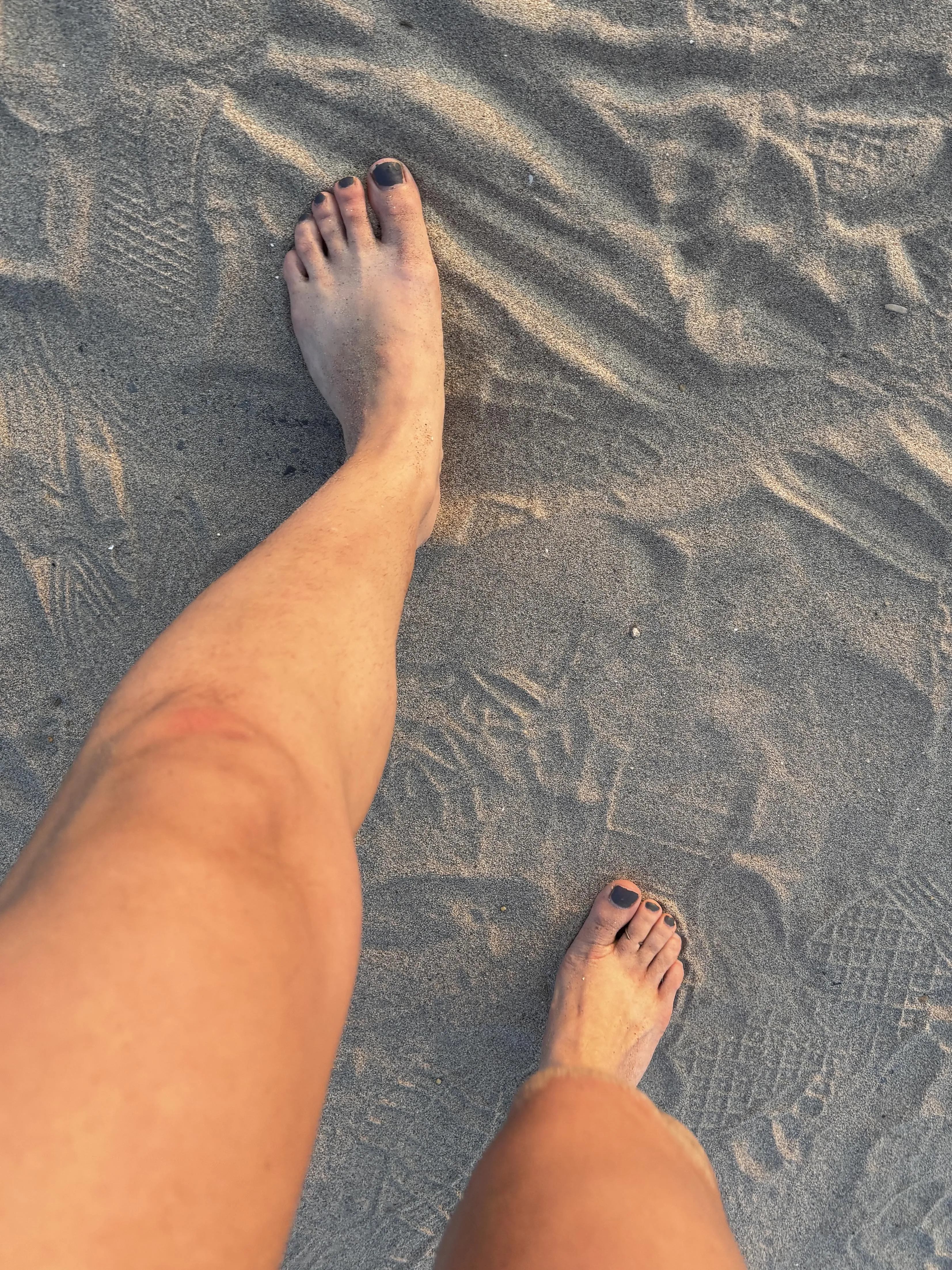 Feet in the sand