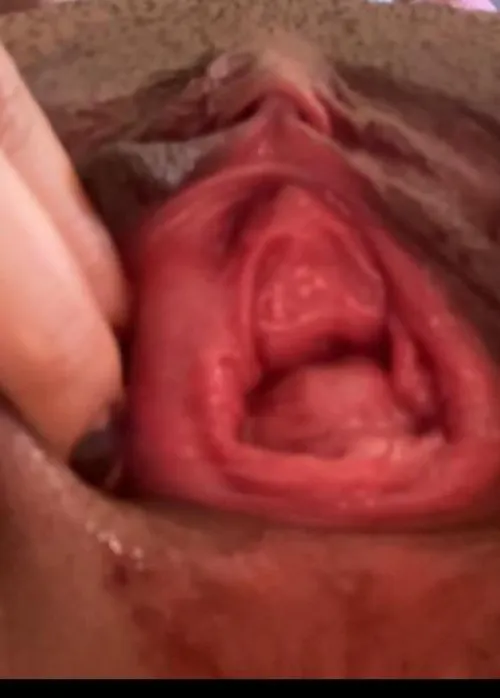 Trying to open my pussy as much as I can it’s slippery