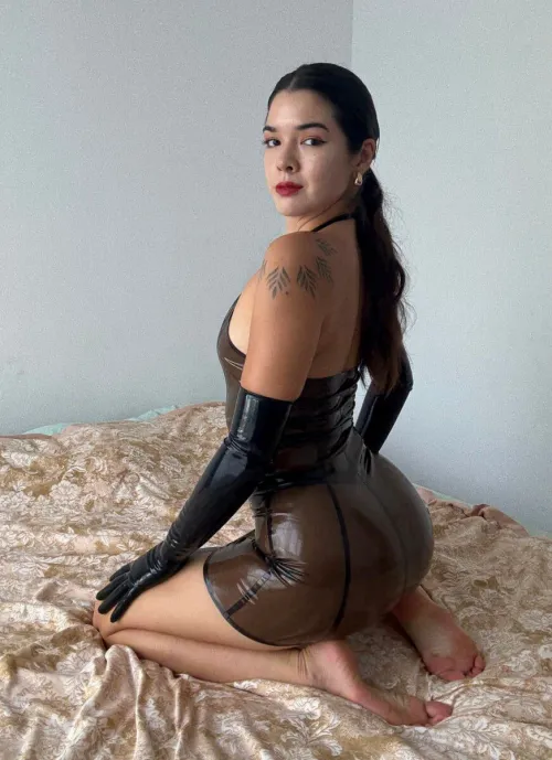 You worship every inch of my shiny latex, don't you? It clings to me, making me feel powerful, and you can't resist.