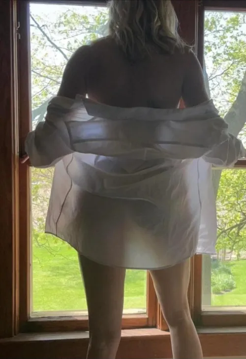 Grandma just seeing what the neighbours are looking at