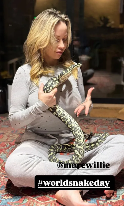 Tara loves playing with big snakes