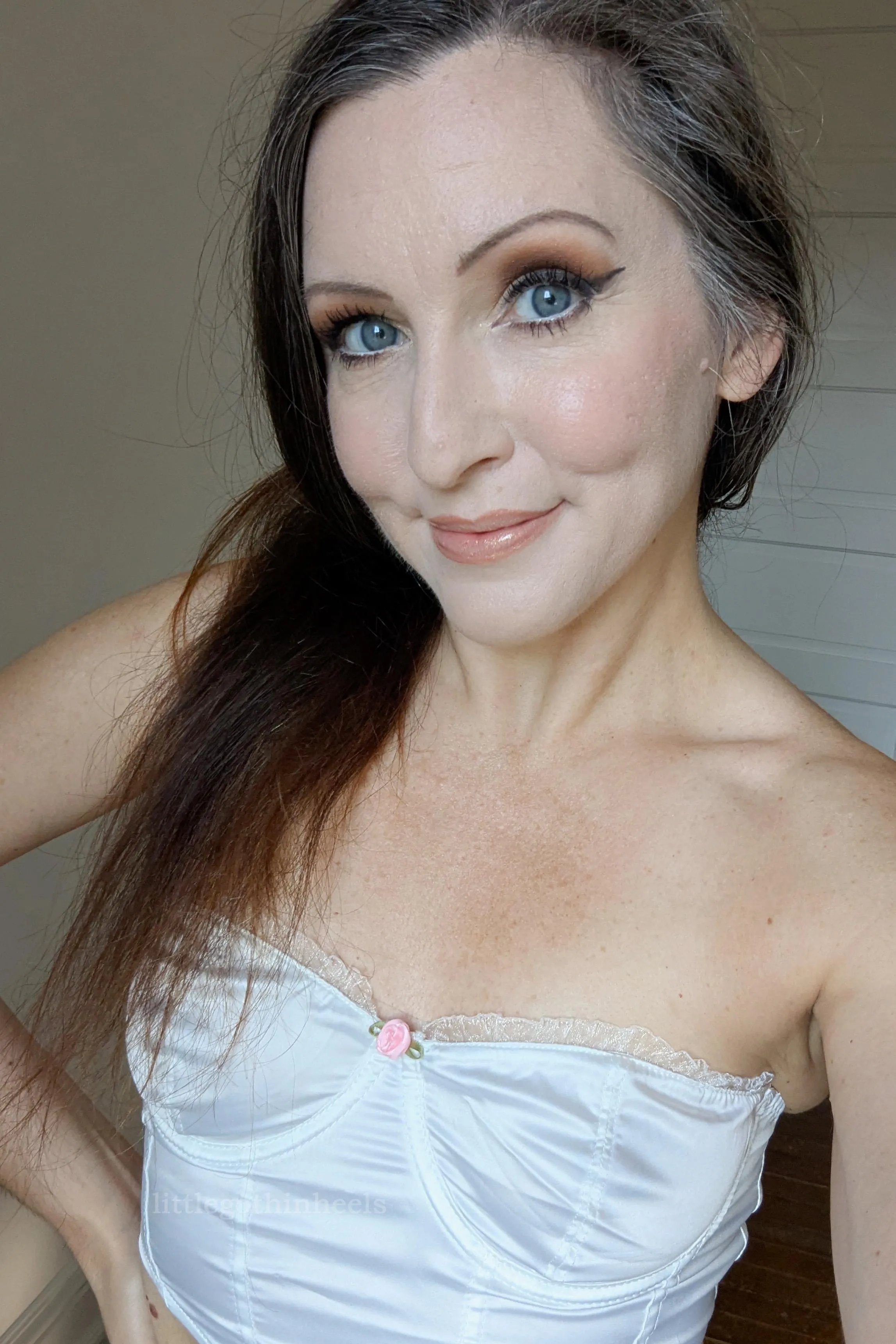 Big blue eyes and lots of chest freckles