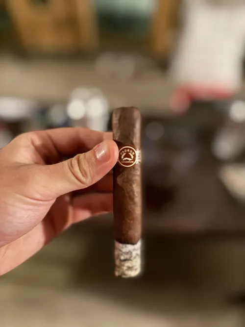 Enjoying a Padron Importado at the frat house tonight. A way better buzz than the Liga #9. Not getting sick. A beautiful flavor.