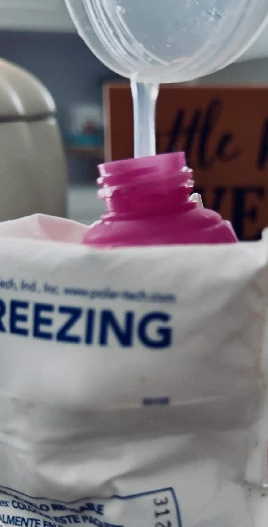 Topping off a squeeze bottle for someone 😈💦