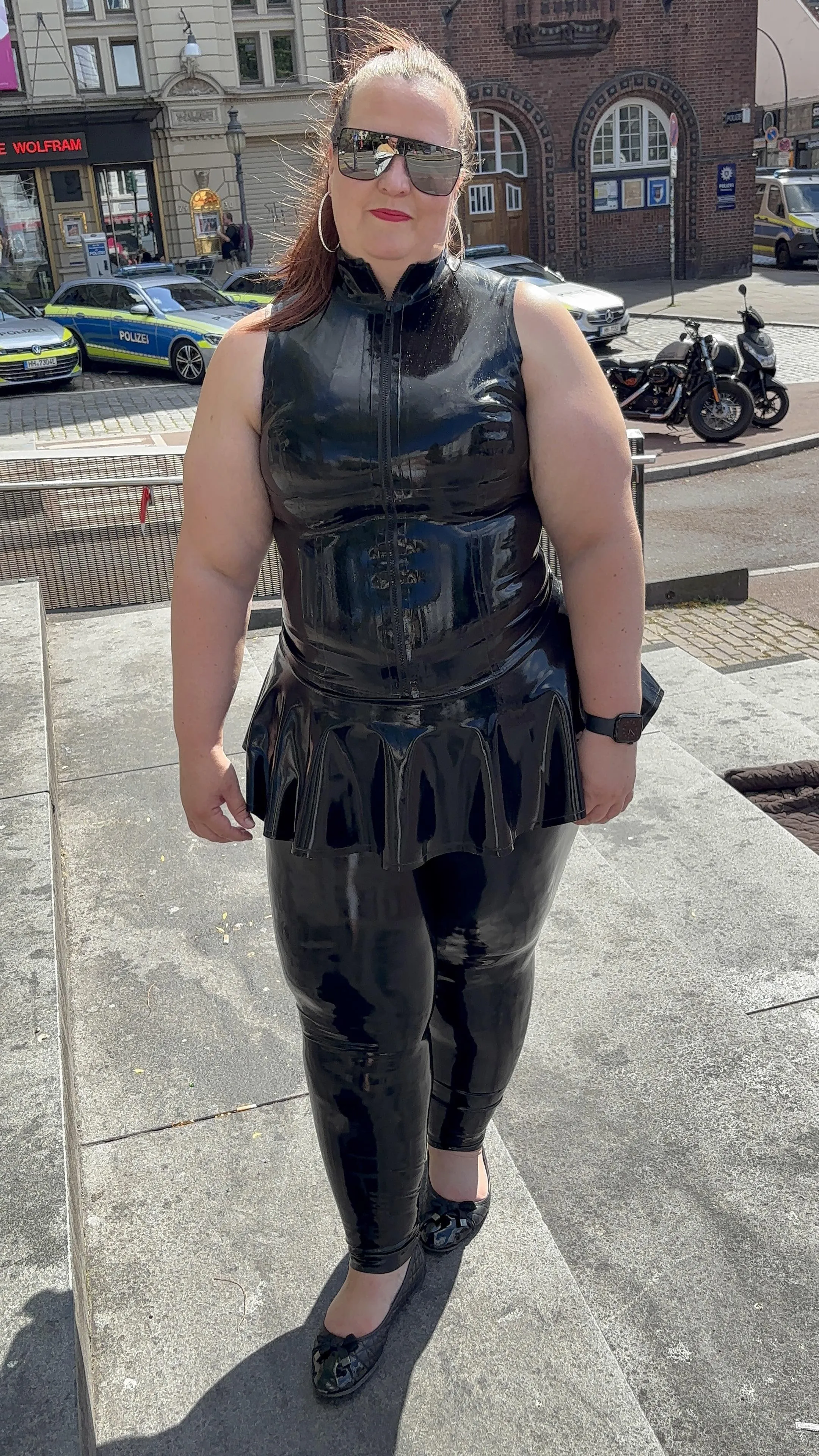 In shiny latex out in public