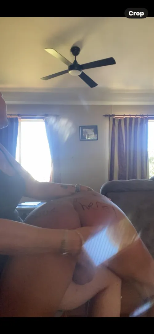 Arse spanking from clothed woman.