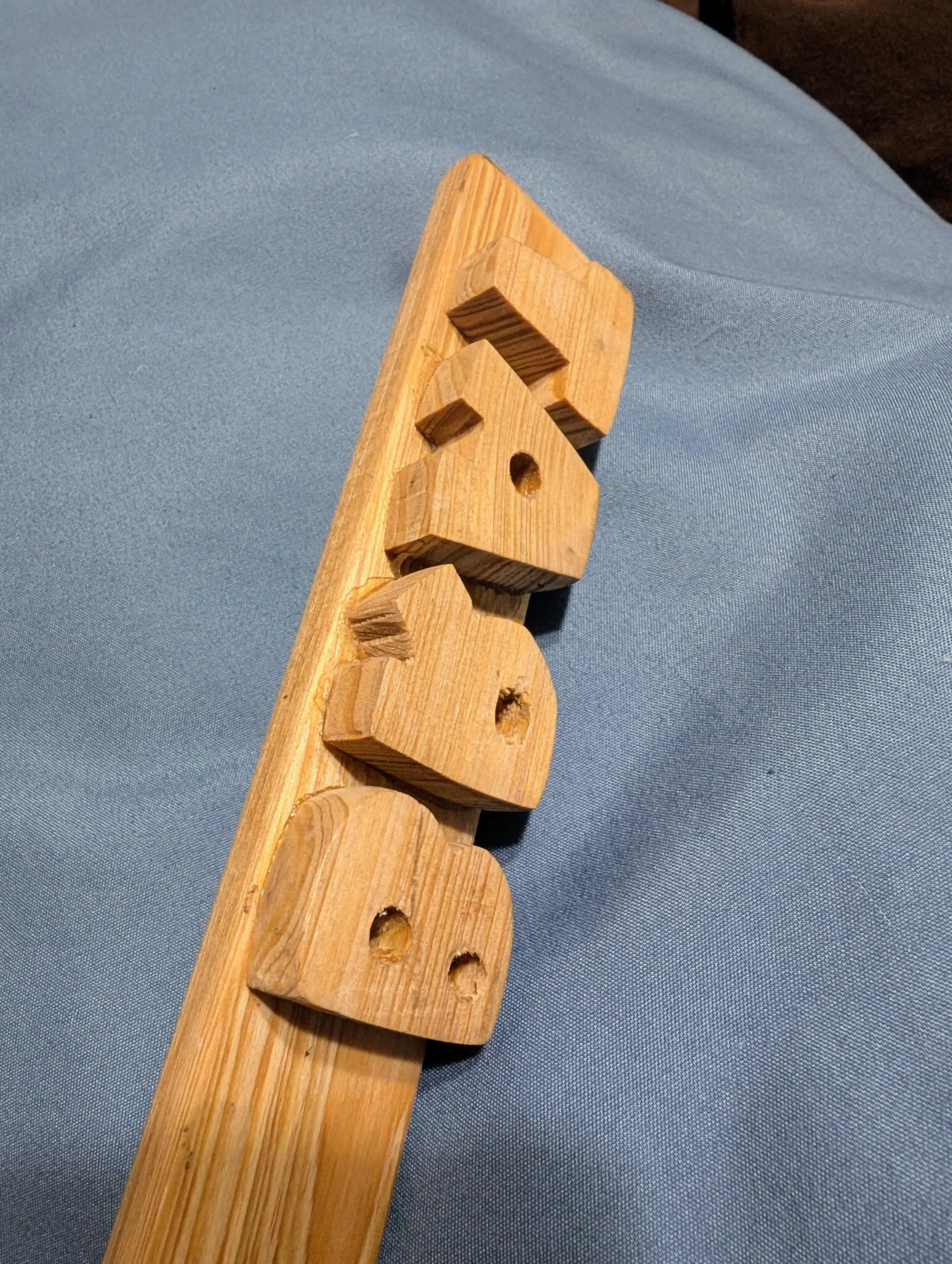 The BRAT paddle. Thick, raised, closely-spaced letters that leave the entire imprint on a bratty body