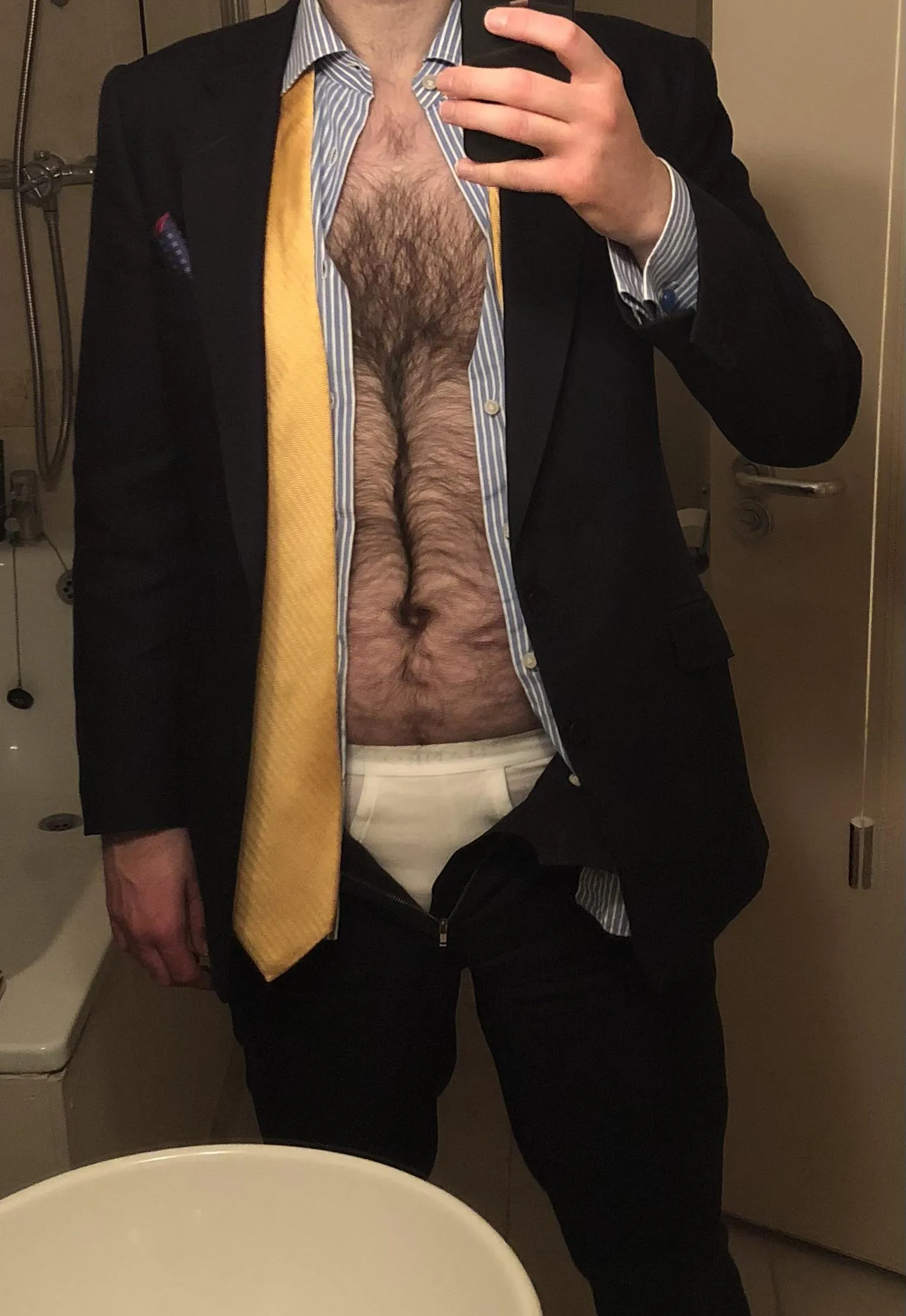 Hopefully there’s something here for anyone into chest hair, suits, and white underwear.