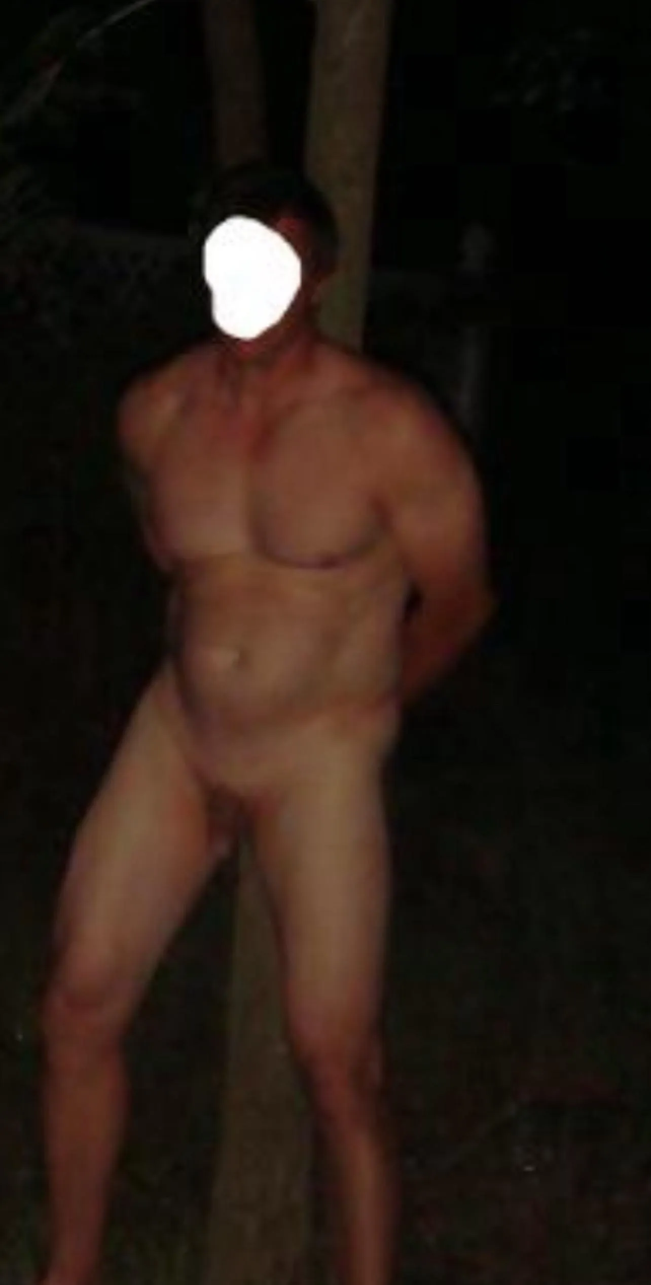 Tied naked to a tree