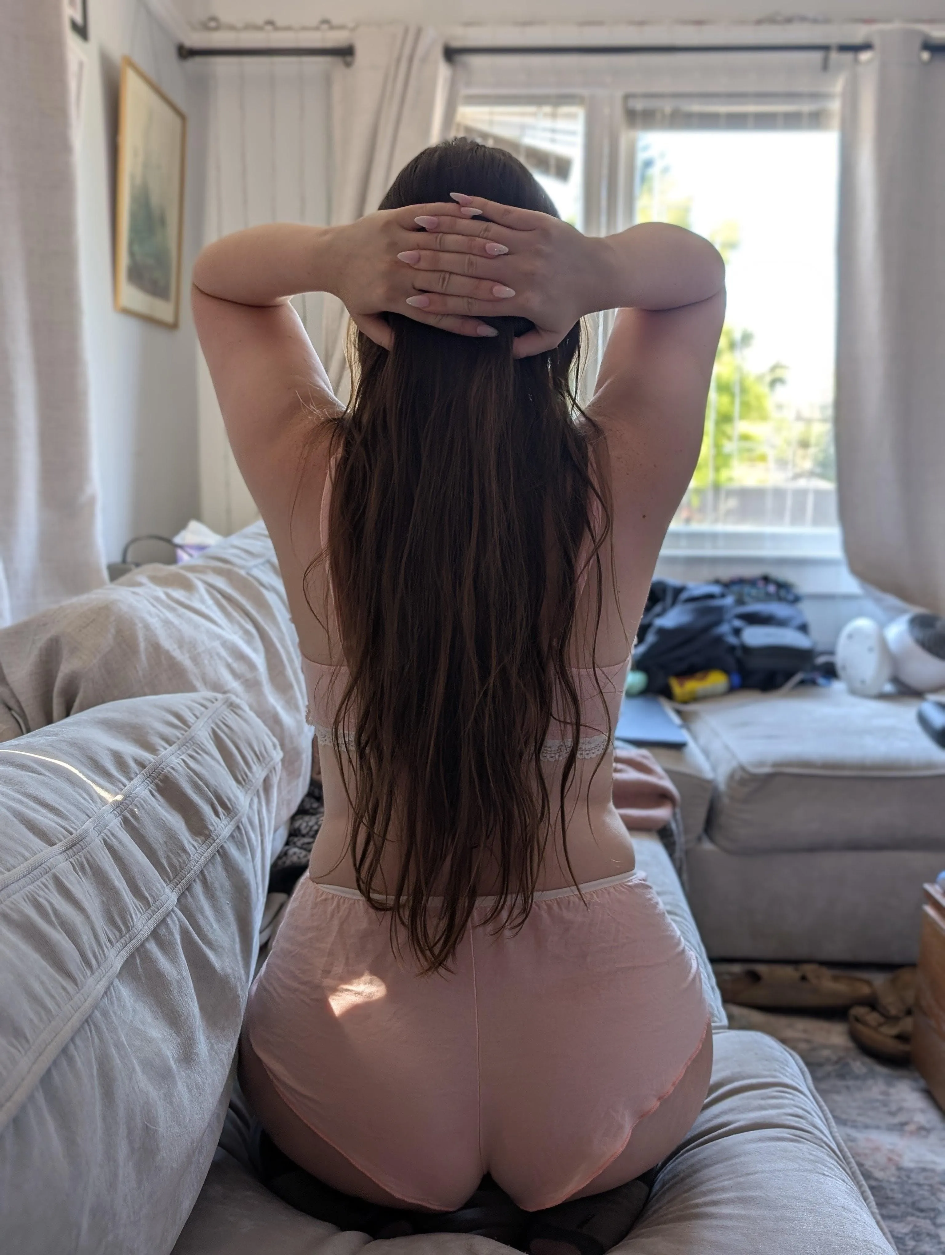 I the way my hair brushes against my lower back