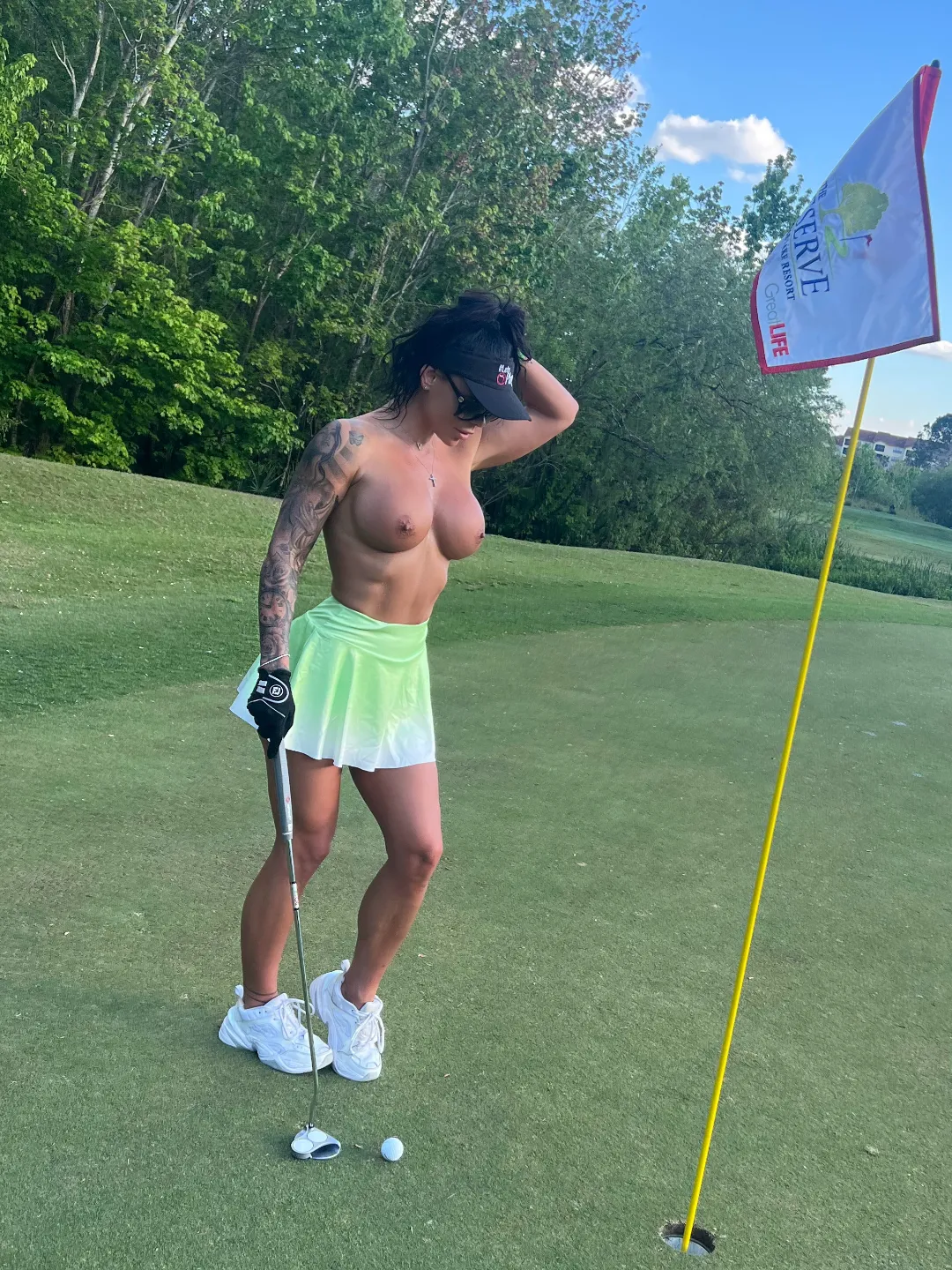 The guys dared me to play topless one public course ... and here I am , I don't ever dissapoint