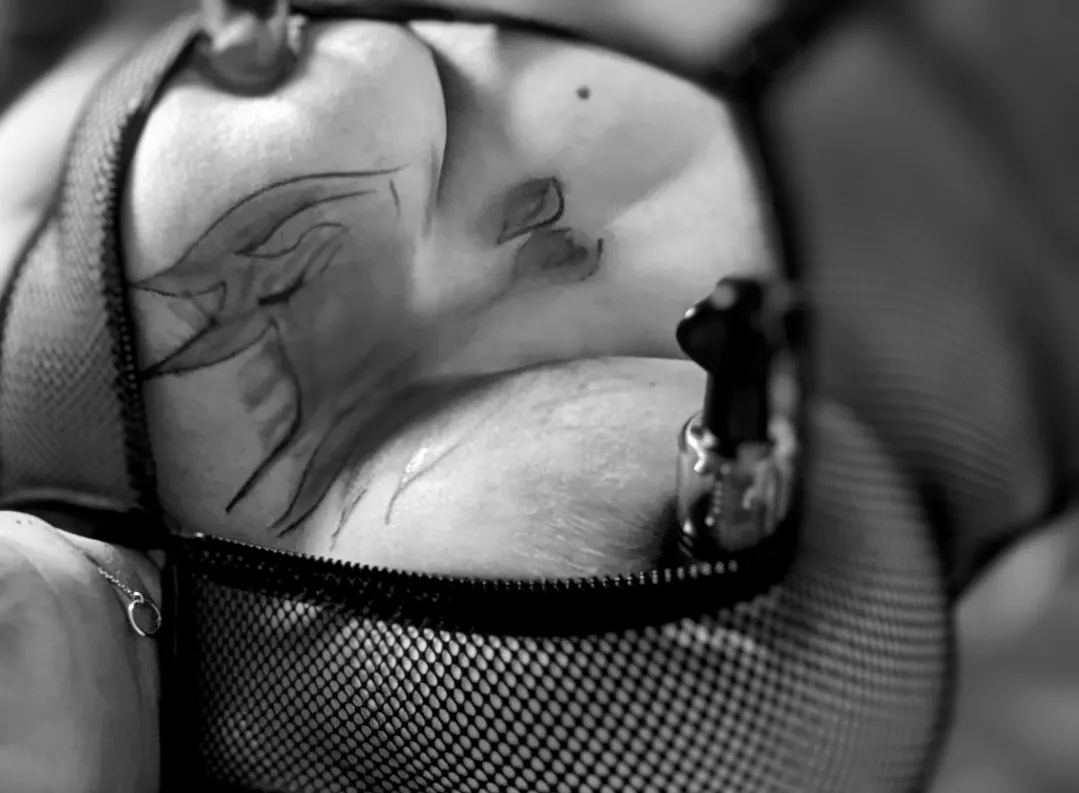 Fishnet painted pumped titties [56F].. a moment captured