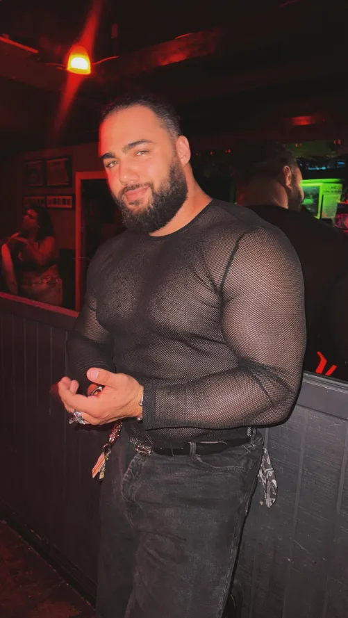 Muscle bear saying hi