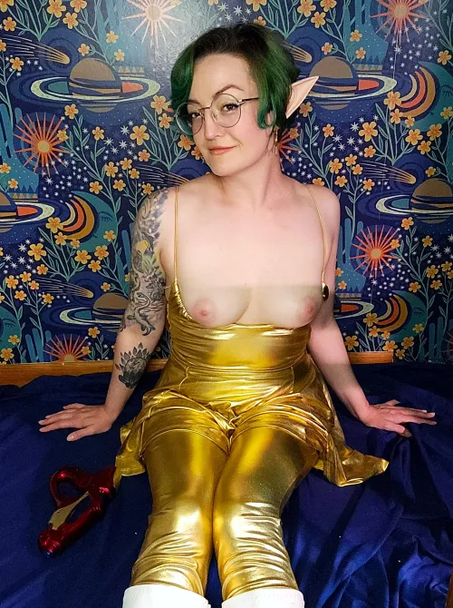 A space fairy in her gold space suit
