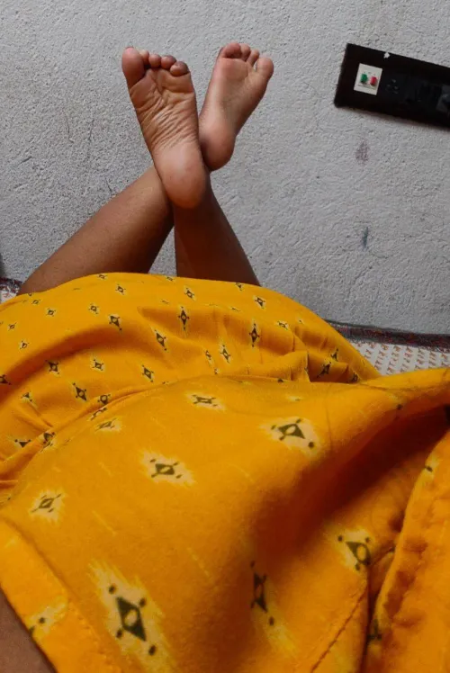 Lazy desi evening, dress on, feet up 💛 Who else loves this view?