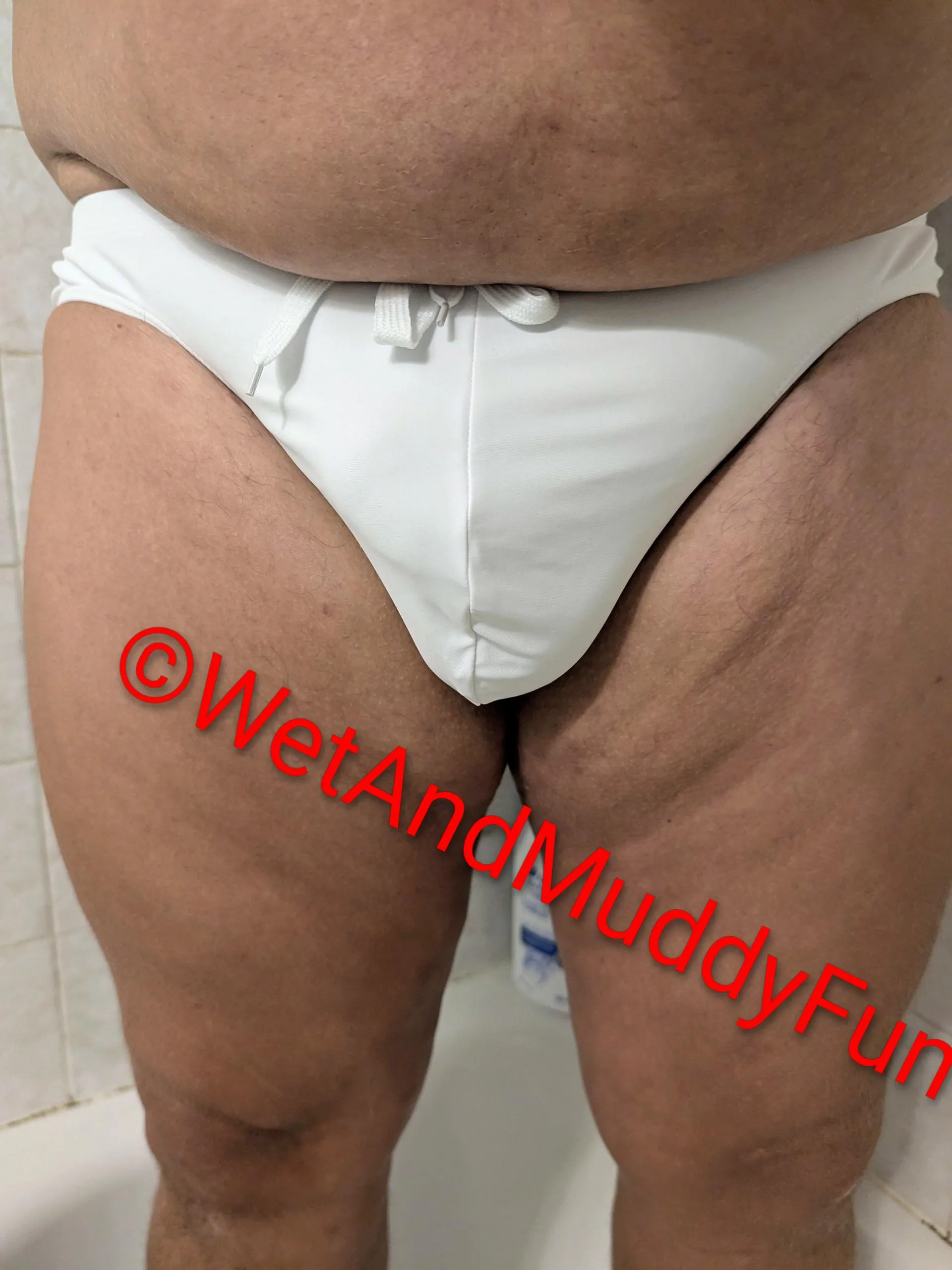 Trying on my new swimsuit.